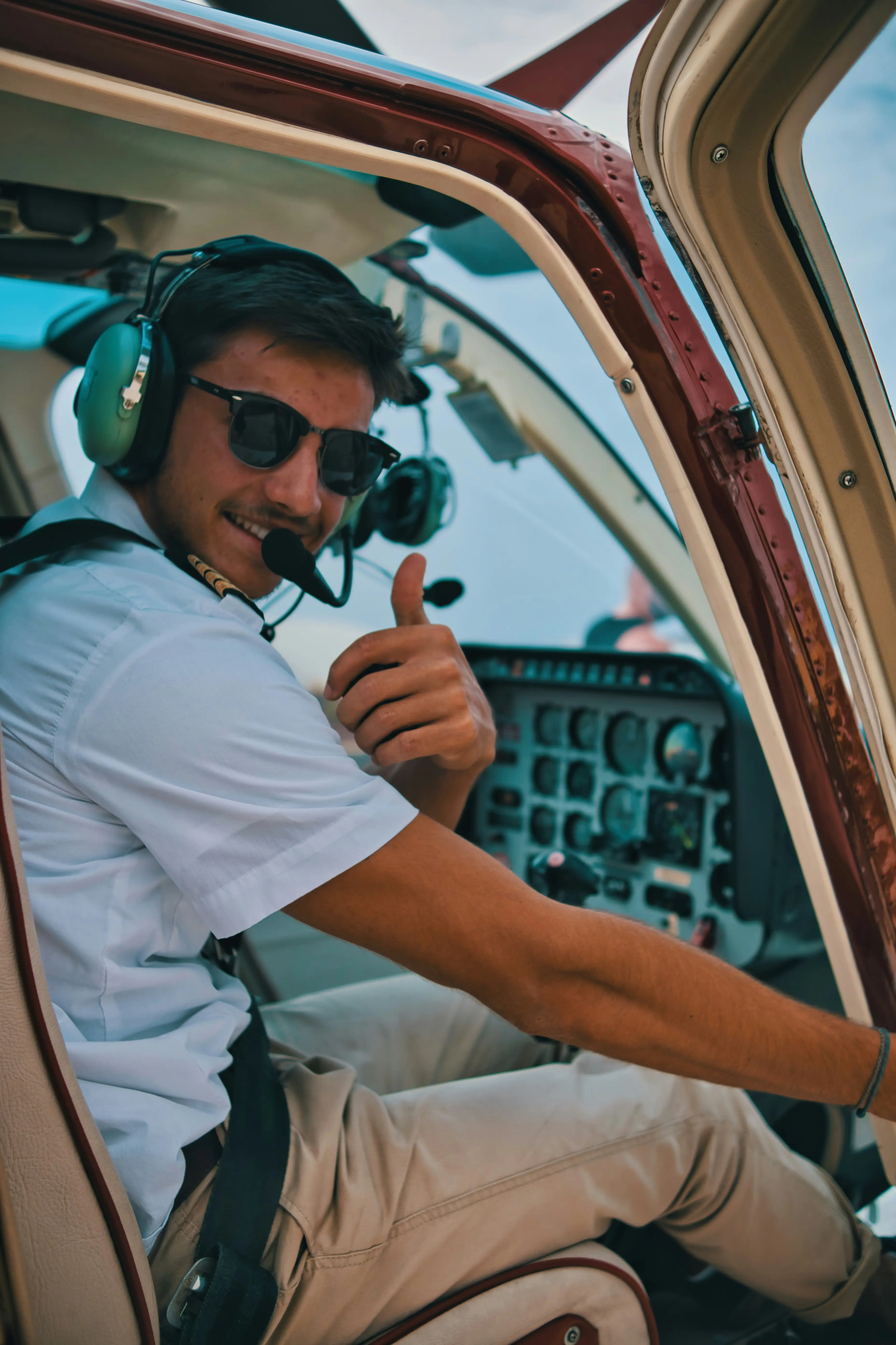 Student pilot practicing on simulator, instrument rating training